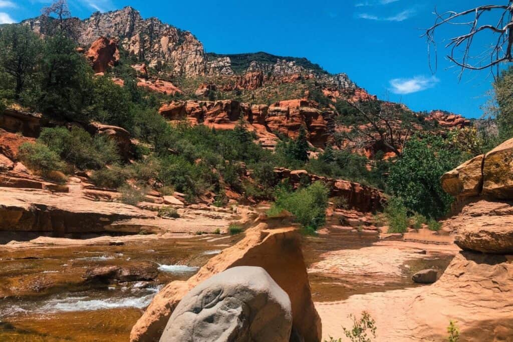 Red mountains and river landscape 